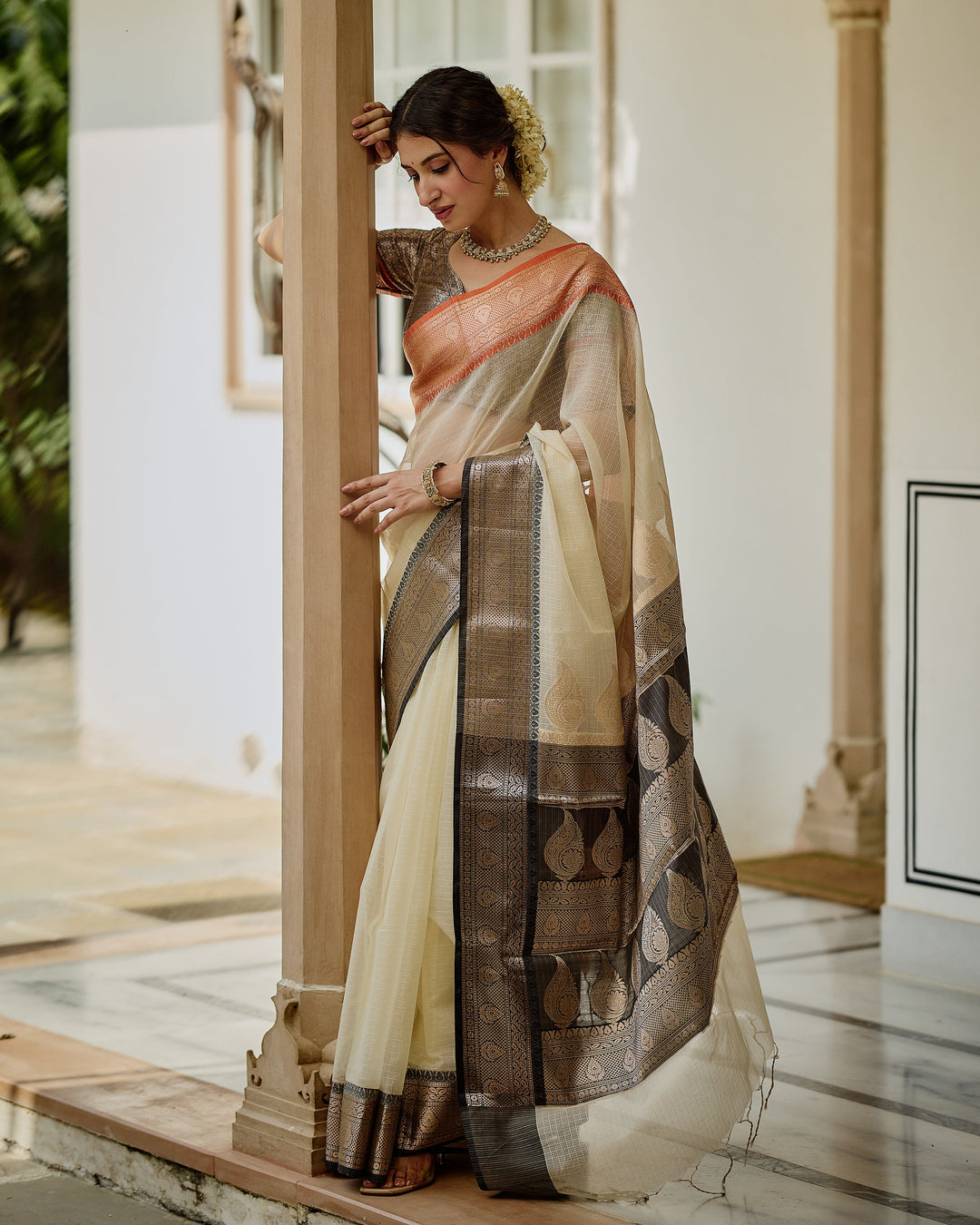 Evora White Black Doria Butta Border Saree