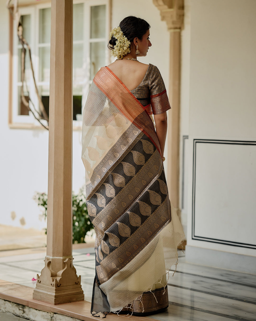 Evora White Black Doria Butta Border Saree