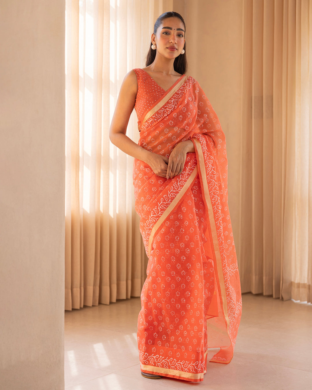 Aabheri Orange Doria Printed Saree