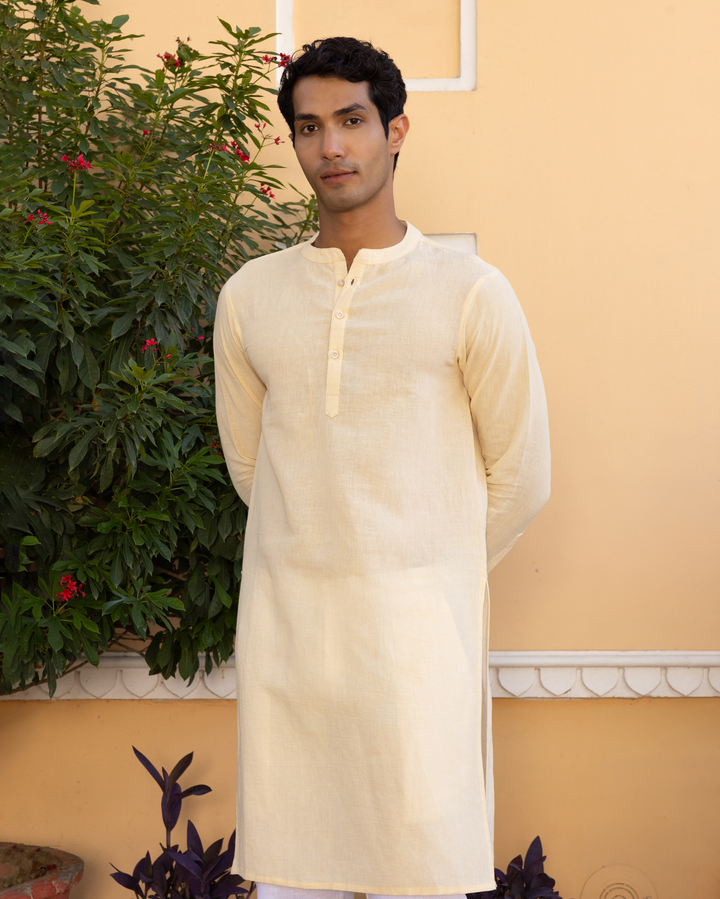 Abhi Cream Solid Cotton Flex Kurta