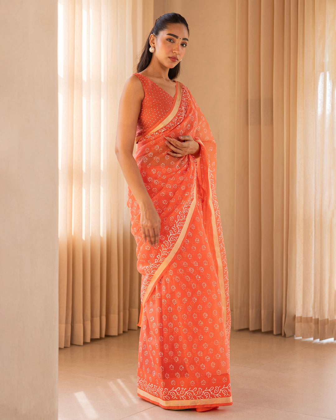 Aabheri Orange Doria Printed Saree