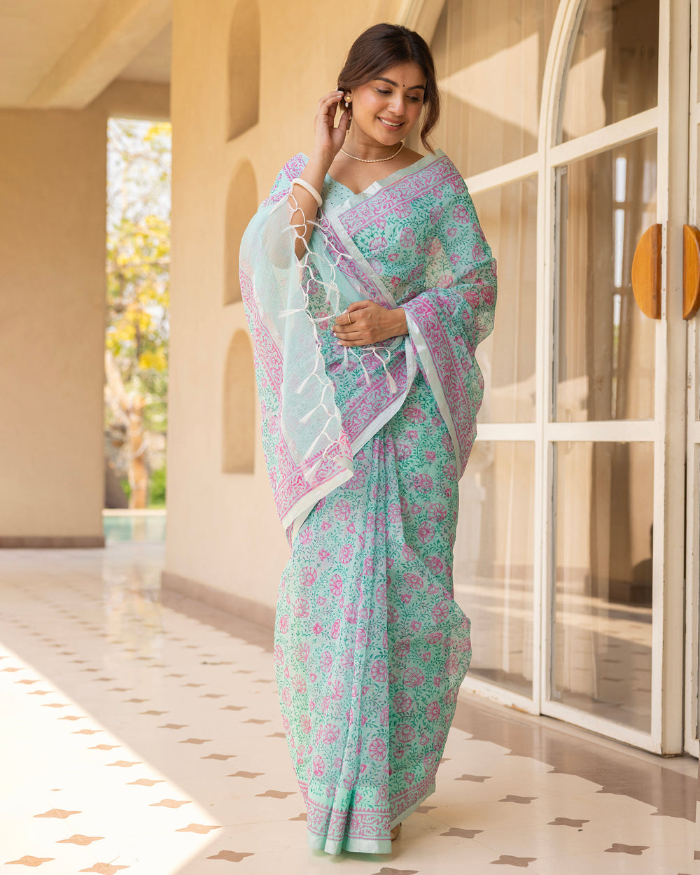 Kamalini Sea Green Doria Printed Saree