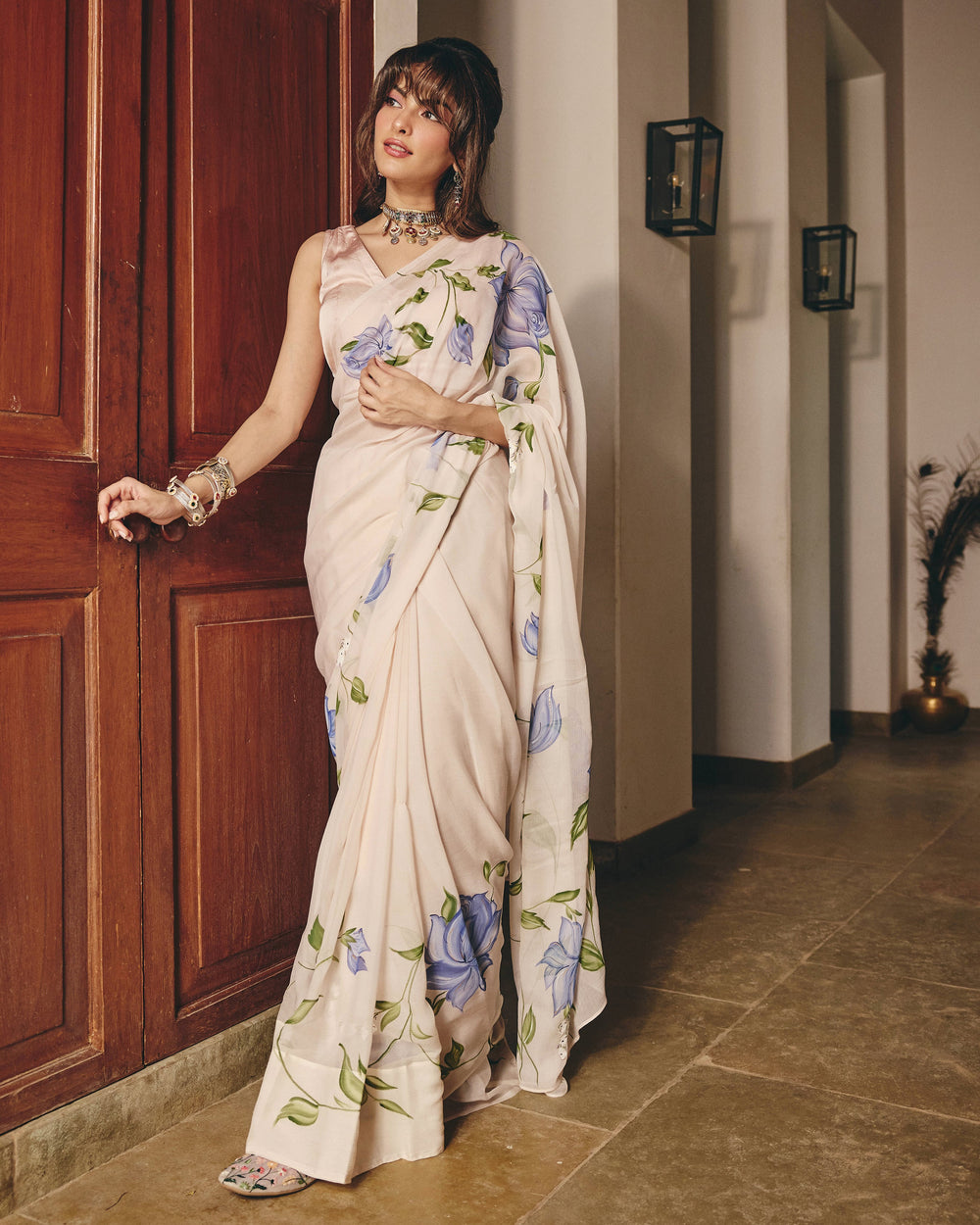 Nilambari Cream Handpainted Chiffon Saree