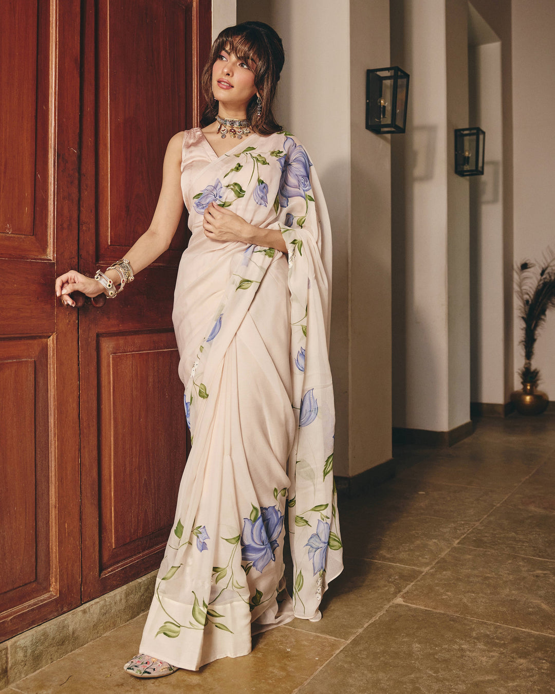 Nilambari Cream Handpainted Chiffon Saree