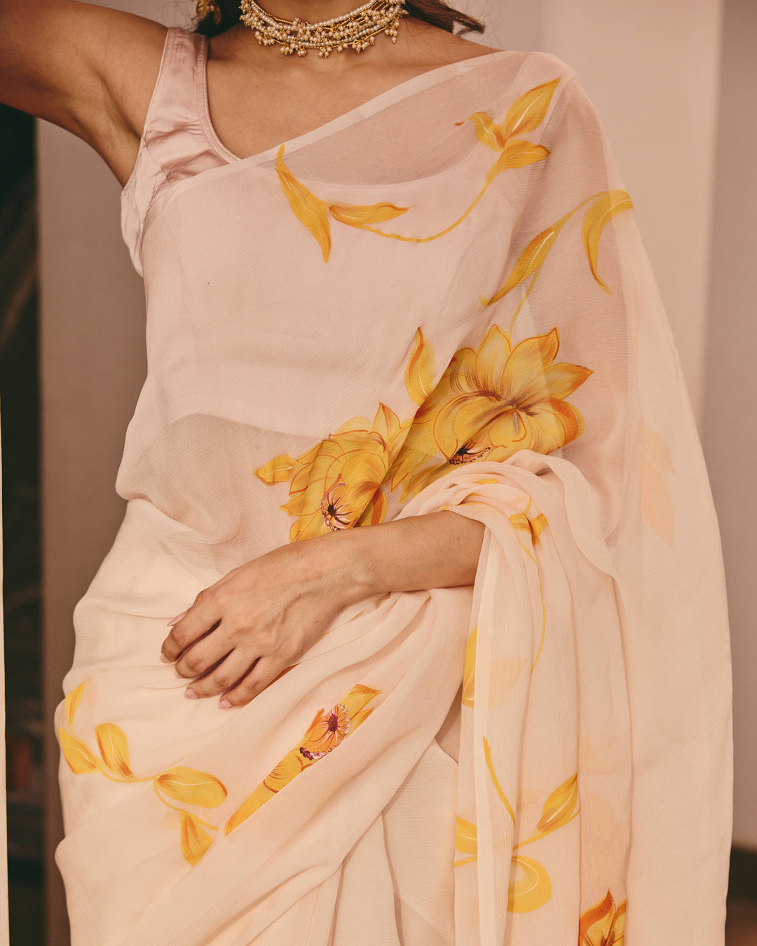 Raagi Cream Handpainted Chiffon Saree