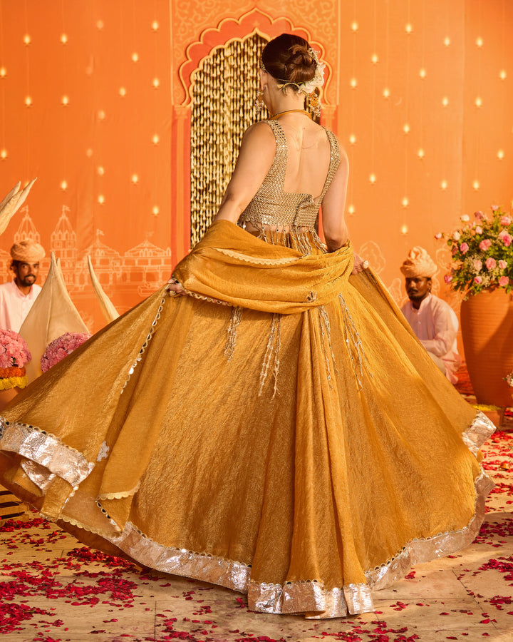 Vasudha Brownish Orange Tissue Lehenga Set