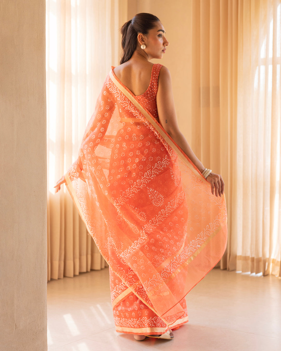 Aabheri Orange Doria Printed Saree