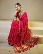 Whimisical Red-Pink Silk Bandhani Saree