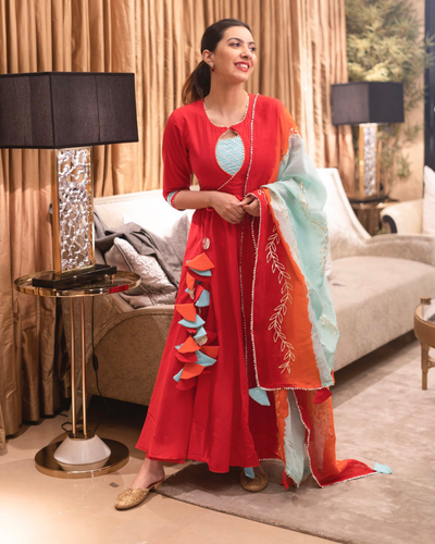 Silk Trendy Salwar Kameez in Rani Enhanced with Embroidered